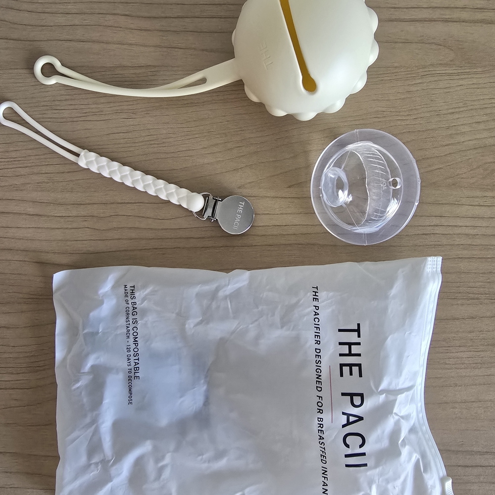 The Paci Silicone Pacifier with Clip - Cream